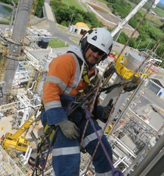 Abseiling worker
